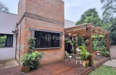 Casa em condomínio fechado com 3 quartos à venda na rua das camélias, 32, são lucas, viamão, 105 m2 por r$ 560.500