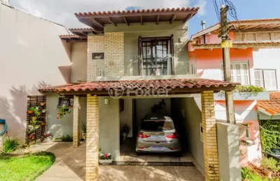 Casa em condomínio fechado com 3 quartos à venda na rua erechim, 100, nonoai, porto alegre, 187 m2 por r$ 750.000