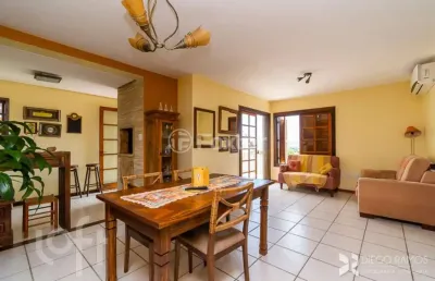 Casa em condomínio fechado com 3 quartos à venda na avenida jacuí, 1248, cristal, porto alegre, 193 m2 por r$ 700.000