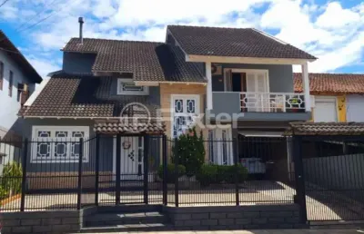 Casa com 3 quartos à venda na rua itaqui, 408, parque da matriz, cachoeirinha, 248 m2 por r$ 780.000