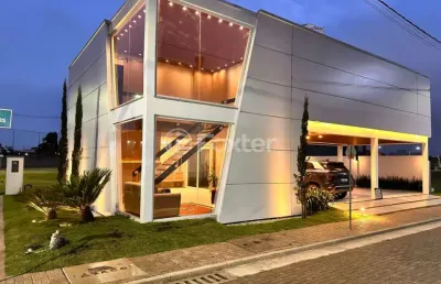 Casa em condomínio fechado com 3 quartos à venda na avenida frederico warstat, 695, sans souci, eldorado do sul, 235 m2 por r$ 1.480.000