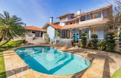 Casa com 4 quartos à venda na rua mem de sá, 570, nossa senhora das graças, canoas, 600 m2 por r$ 2.660.000