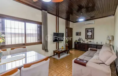 Casa com 3 quartos à venda na rua coelho neto, 844, sumaré, alvorada, 125 m2 por r$ 451.250