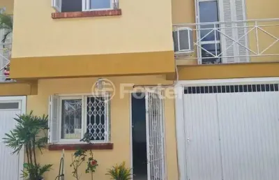 Casa em condomínio fechado com 3 quartos à venda na rua barbosa neto, 205, cavalhada, porto alegre, 129 m2 por r$ 570.000