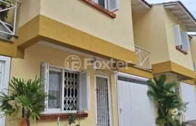 Casa em condomínio fechado com 3 quartos à venda na rua barbosa neto, 205, cavalhada, porto alegre, 129 m2 por r$ 570.000