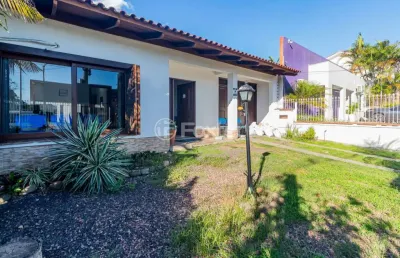 Casa com 3 quartos à venda na avenida juca batista, 1626, cavalhada, porto alegre, 194 m2 por r$ 665.000