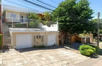 Casa com 3 quartos à venda na rua doutor barbosa gonçalves, 41, chácara das pedras, porto alegre, 141 m2 por r$ 900.000