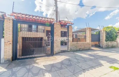 Casa com 4 quartos à venda na rua xavier da cunha, 581, nonoai, porto alegre, 193 m2 por r$ 689.000