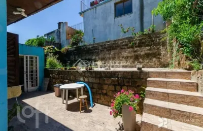 Casa com 3 quartos à venda na rua osmar meletti, 82, espírito santo, porto alegre, 118 m2 por r$ 420.000