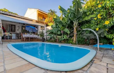 Casa com 3 quartos à venda na rua menezes paredes, 256, nonoai, porto alegre, 131 m2 por r$ 551.000