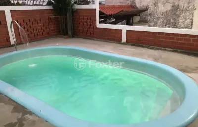 Casa com 3 quartos à venda na avenida tiradentes, 970, aparecida, alvorada, 200 m2 por r$ 419.000