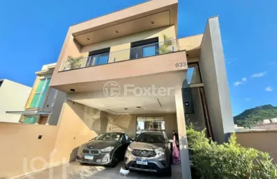 Casa com 4 quartos à venda na avenida wilson castelo branco, 633, beira rio, biguaçu, 300 m2 por r$ 2.651.000
