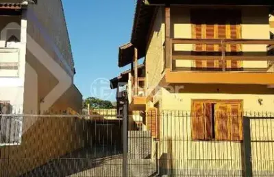 Casa com 4 quartos à venda na rua oiampi, 100, guarujá, porto alegre, 325 m2 por r$ 700.000
