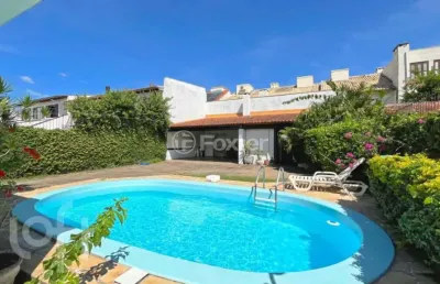 Casa com 3 quartos à venda na avenida saul nonnenmacher, 127, ipanema, porto alegre, 330 m2 por r$ 799.000
