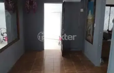 Casa com 2 quartos à venda na avenida faria lobato, 58, sarandi, porto alegre, 300 m2 por r$ 300.000