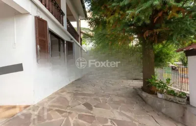 Casa com 5 quartos à venda na rua guajuvira, 104, guarani, novo hamburgo, 226 m2 por r$ 490.000