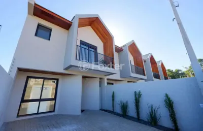 Casa em condomínio fechado com 3 quartos à venda na rua professora delphina ferrari, 236, igara, canoas, 124 m2 por r$ 720.000
