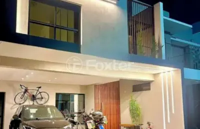 Casa em condomínio fechado com 3 quartos à venda na avenida deltaville, 08, beira rio, biguaçu, 180 m2 por r$ 1.590.000
