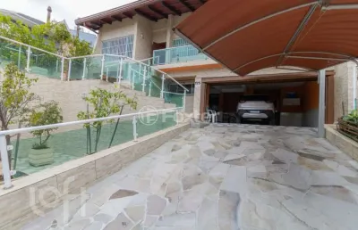 Casa com 4 quartos à venda na rua senador annibal di primio beck, 175, boa vista, porto alegre, 495 m2 por r$ 2.100.000
