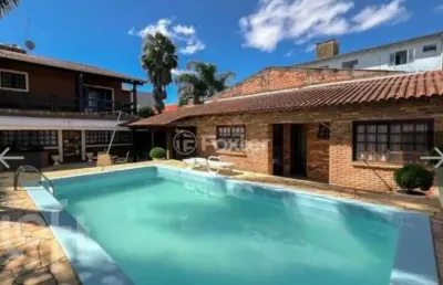 Casa com 4 quartos à venda na rua bernardino de oliveira fonseca, 215, centro, gravataí, 340 m2 por r$ 2.300.000