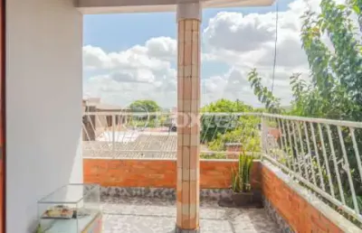 Casa com 3 quartos à venda na rua fernando souto da silva, 279, morro santana, porto alegre, 123 m2 por r$ 698.000