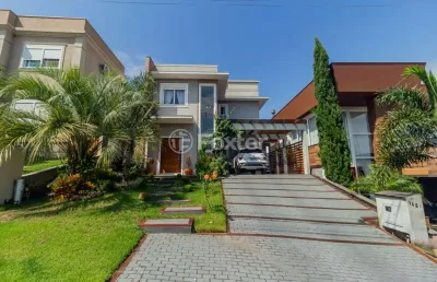 Casa em condomínio fechado com 3 quartos à venda na avenida senador salgado filho, 8500, querência, viamão, 205 m2 por r$ 1.490.000