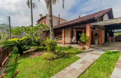 Casa em condomínio fechado com 3 quartos à venda na rua pitangueiras, 169, são lucas, viamão, 167 m2 por r$ 1.250.000