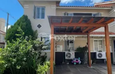 Casa em condomínio fechado com 3 quartos à venda na avenida joão ferreira jardim, 140, parque santa fé, porto alegre, 116 m2 por r$ 378.000