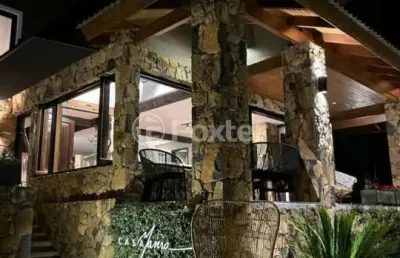 Casa em condomínio fechado com 4 quartos à venda na rua biarrittz, 159, planalto, gramado, 282 m2 por r$ 4.928.000