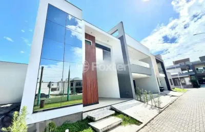 Casa em condomínio fechado com 3 quartos à venda na avenida deltaville, 141, beira rio, biguaçu, 193 m2 por r$ 1.299.000