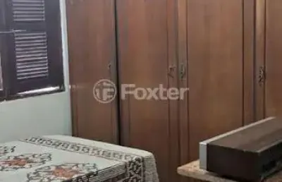 Casa com 3 quartos à venda na rua ângelo passuelo, 390, vila nova, porto alegre, 262 m2 por r$ 750.000