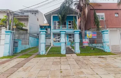 Casa com 3 quartos à venda na rua osmindo júlio kuhn, 369, parque santa fé, porto alegre, 400 m2 por r$ 750.500