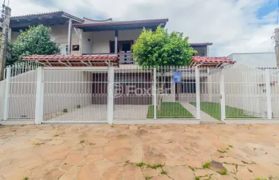 Casa com 4 quartos à venda na rua carlos gomes, 237, harmonia, canoas, 212 m2 por r$ 920.000