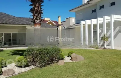 Casa em condomínio fechado com 6 quartos à venda na avenida central, 2000, zona nova, capão da canoa, 600 m2 por r$ 3.550.000