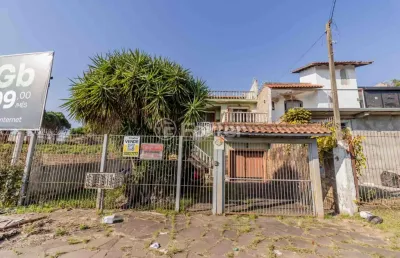Casa com 3 quartos à venda na avenida tiradentes, 378, aparecida, alvorada, 279 m2 por r$ 500.000