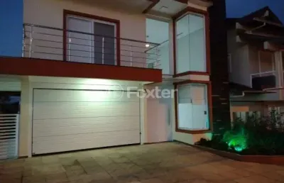 Casa em condomínio fechado com 4 quartos à venda na rua antônio ramos, 40, loteamento jardim timbaúva, gravataí, 268 m2 por r$ 890.000