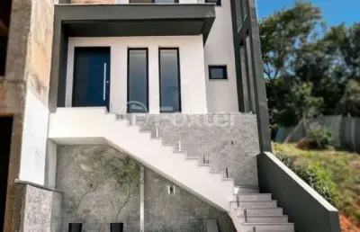 Casa em condomínio fechado com 3 quartos à venda na rua tancredo neves, 990, jansen, gravataí, 150 m2 por r$ 799.000