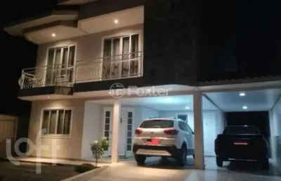 Casa com 3 quartos à venda na rua graciliano carlos de quadros, 164, centro, palhoça, 209 m2 por r$ 1.070.000