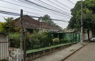 Casa com 3 quartos à venda na rua delfino riet, 116, santo antônio, porto alegre, 1009 m2 por r$ 1.490.000