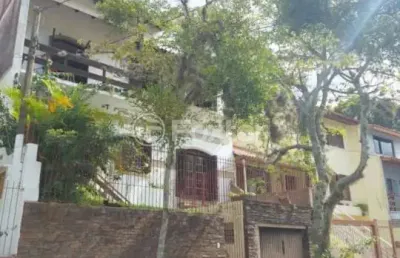 Casa com 4 quartos à venda na rua nero josé da silva filho, 205, partenon, porto alegre, 260 m2 por r$ 650.000