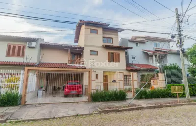 Casa com 3 quartos à venda na rua luiz delfino, 109, espírito santo, porto alegre, 182 m2 por r$ 850.000