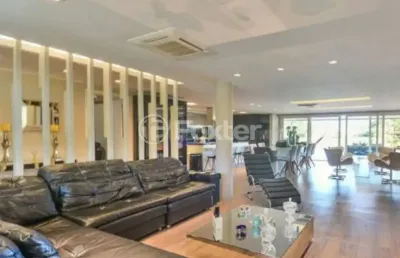 Casa em condomínio fechado com 4 quartos à venda na avenida juca batista, 8000, ponta grossa, porto alegre, 478 m2 por r$ 4.200.000