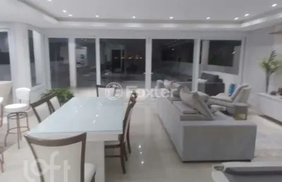 Casa em condomínio fechado com 5 quartos à venda na avenida juca batista, 8000, chapéu do sol, porto alegre, 340 m2 por r$ 2.750.000
