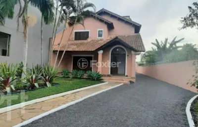 Casa com 5 quartos à venda na rua atílio supertti, 87, vila nova, porto alegre, 283 m2 por r$ 1.510.000