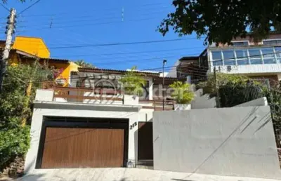 Casa com 3 quartos à venda na rua teixeira de carvalho, 215, medianeira, porto alegre, 181 m2 por r$ 940.000