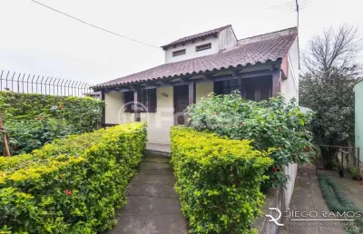 Casa com 3 quartos à venda na avenida rodrigues da fonseca, 1728, vila nova, porto alegre, 188 m2 por r$ 688.000