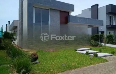 Casa em condomínio fechado com 3 quartos à venda na rua onório germano, 2005, arco íris, capão da canoa, 135 m2 por r$ 1.470.000