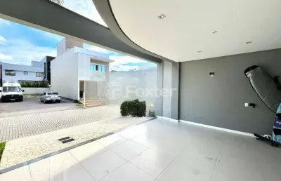 Casa em condomínio fechado com 4 quartos à venda na avenida deltaville, 63, beira rio, biguaçu, 335 m2 por r$ 1.889.000