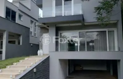 Casa em condomínio fechado com 3 quartos à venda na avenida senador salgado filho, 8500, querência, viamão, 271 m2 por r$ 1.300.000
