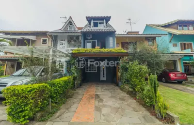 Casa em condomínio fechado com 3 quartos à venda na avenida juca batista, 1458, cavalhada, porto alegre, 132 m2 por r$ 595.000